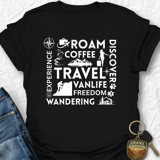 Black t-shirt with white text and graphics on a textured surface