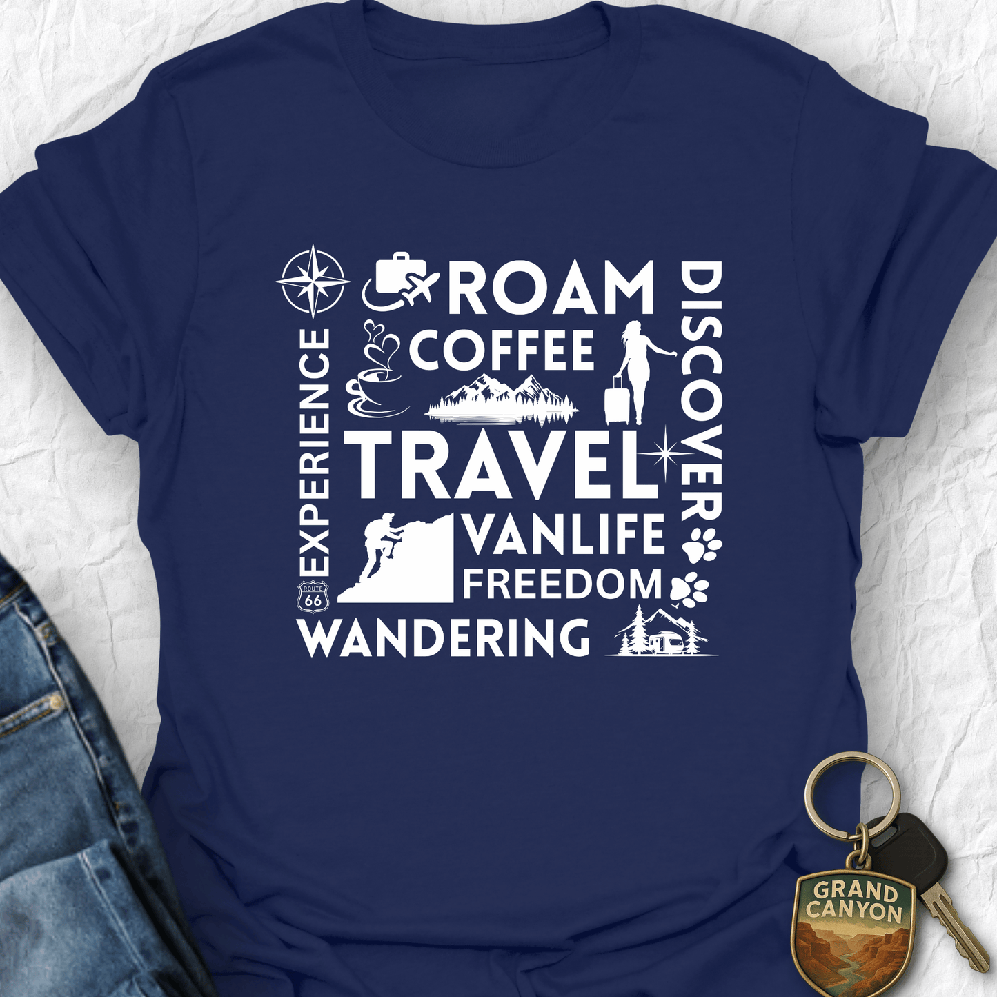 Navy blue t-shirt with white text and graphics on a textured surface.