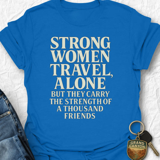 Blue t-shirt with motivational quote on a textured surface