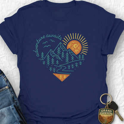 Navy blue t-shirt with nature-themed graphic and keychain on a light gray background