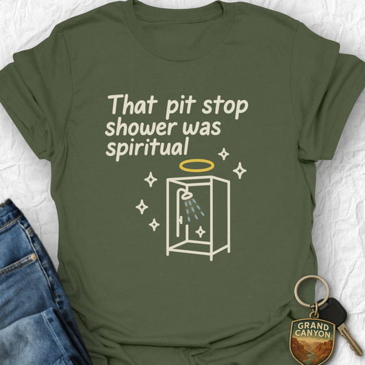 Green t-shirt with humorous graphic and text on a white background