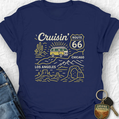 Navy blue t-shirt with 'Cruisin' Route 66' graphic design on a textured white background.