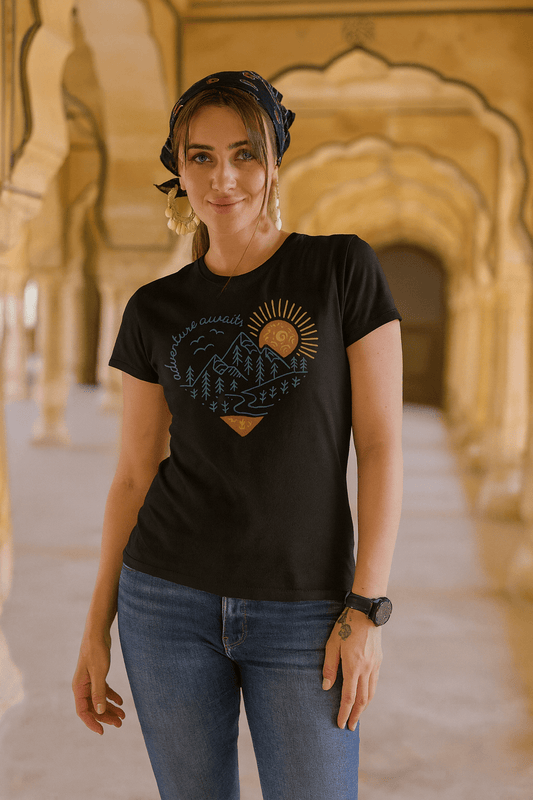 Woman wearing a black t-shirt with a design in an ornate architectural setting